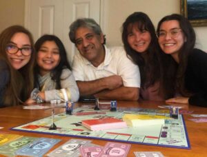 Family with Covidopoly19 game